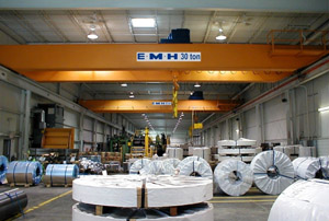 Two 30-ton cranes with engineered hoists handle the demanding service cycle of moving large coils for two shifts a day