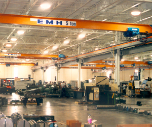 This installation at a manufacturer of roll forming equipment consists of 15 structural girder cranes with capacities from 1/2 to 5 tons. This installation includes five bridge crane runways, with lengths varying from 70 to 250 feet. Nearly all of the cranes are used in workstation areas
